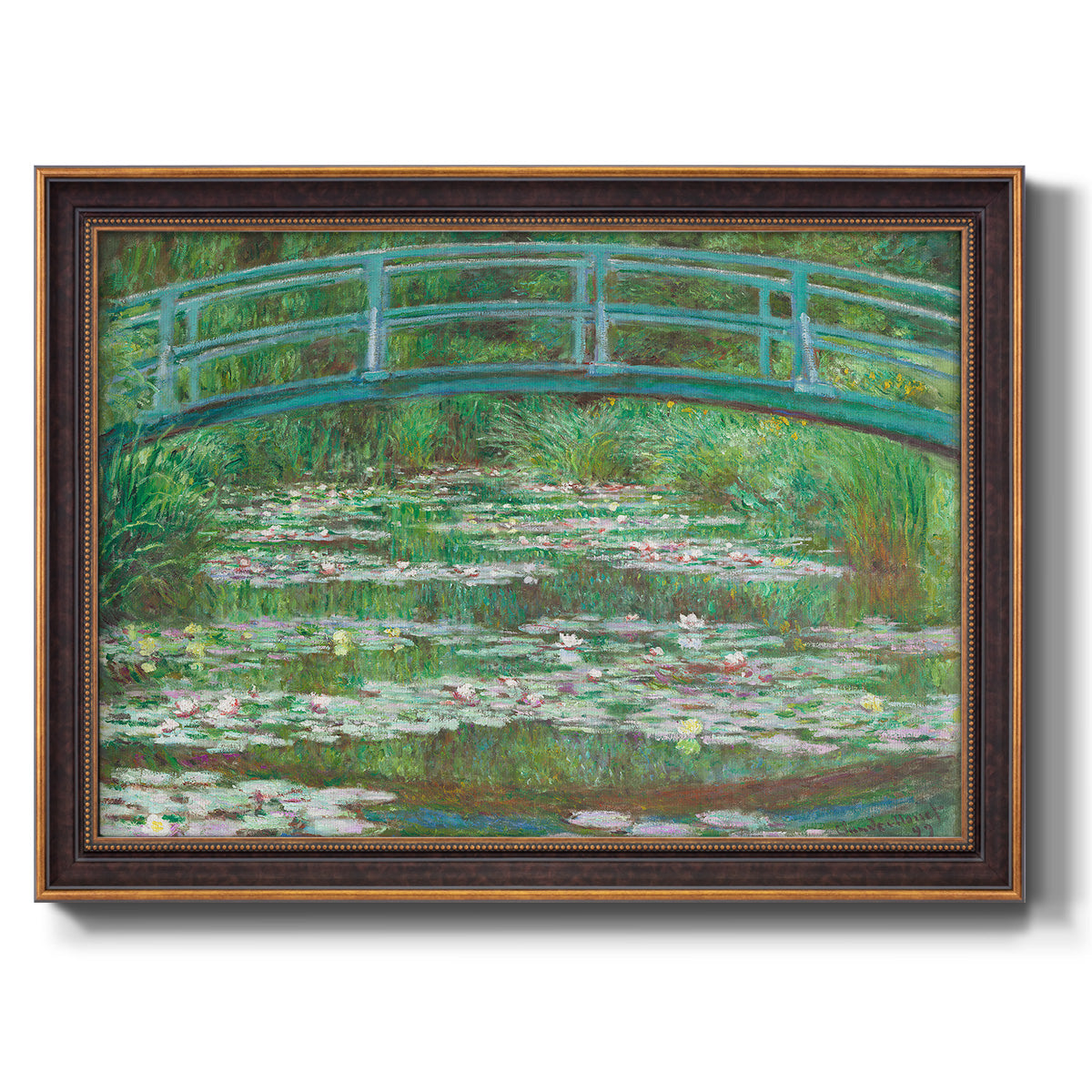 Impressionist garden scene with Japanese bridge and water lilies by Claude Monet printed on canvas in an ornate bronzed mahogany wood frame.