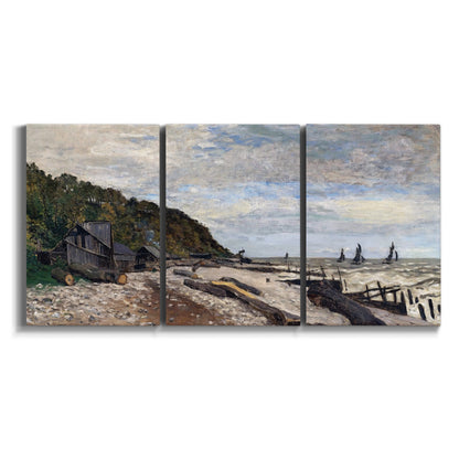 Three-panel canvas wall art featuring open sea along rocky shore on white background.