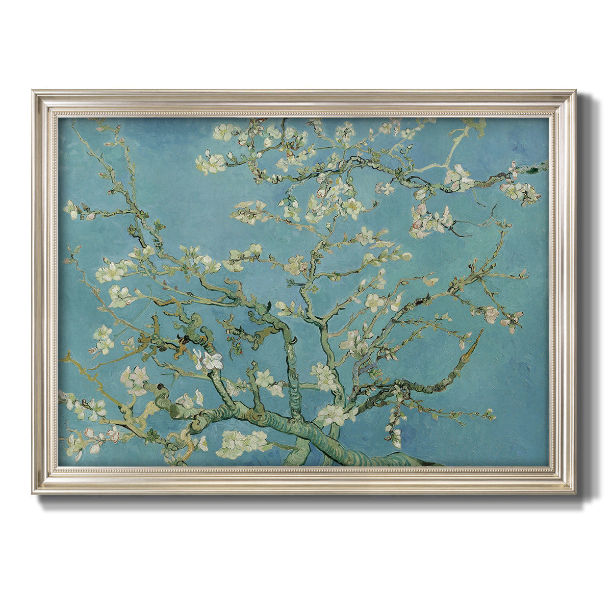 Impressionist flowering almond branch painting by Vincent van Gogh printed on canvas in an ornate champagne frame.