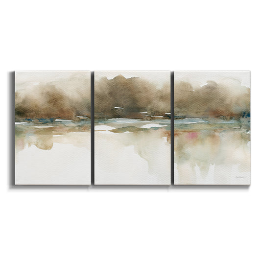 Three-panel canvas wall art featuring soft abstract mirrored reflections on white background.