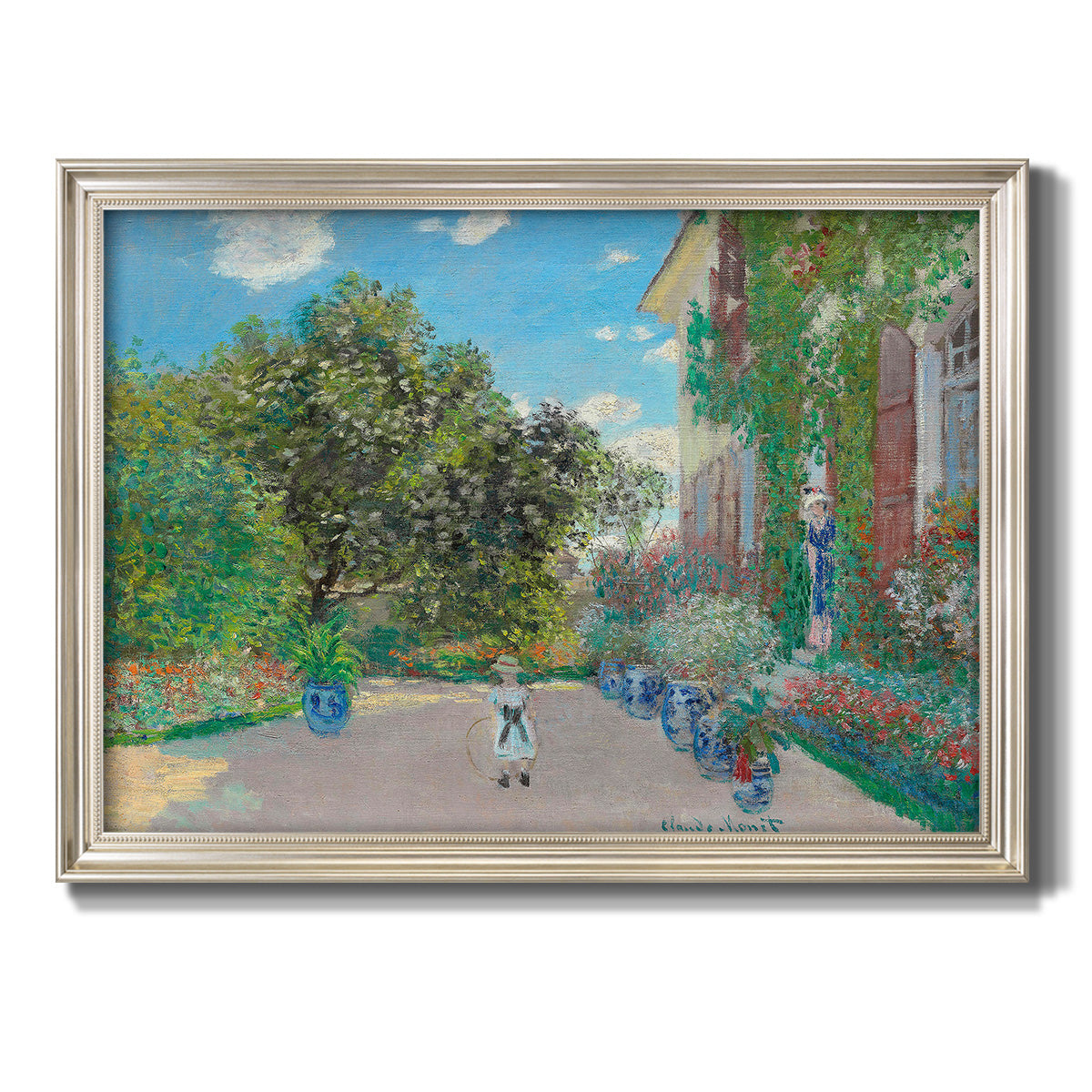 Impressionist residential landscape at Argenteuil by Claude Monet printed on canvas in an ornate champagne frame.