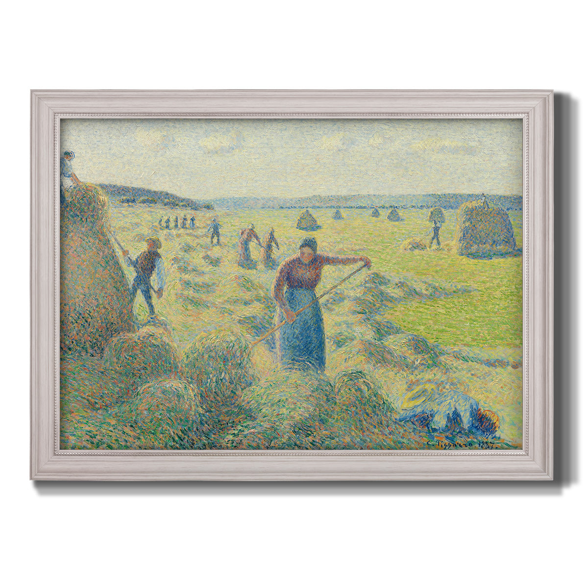 Impressionist rural hay harvest landscape by Camille Pissarro printed on canvas in an ornate weathered white frame.