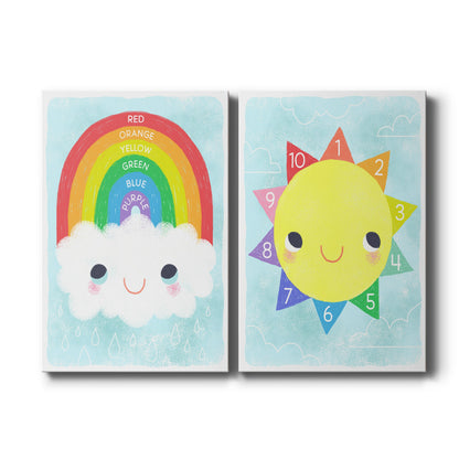Set of two vertical canvas prints featuring cheerful rainbow and sunshine nursery illustration, displayed side by side.
