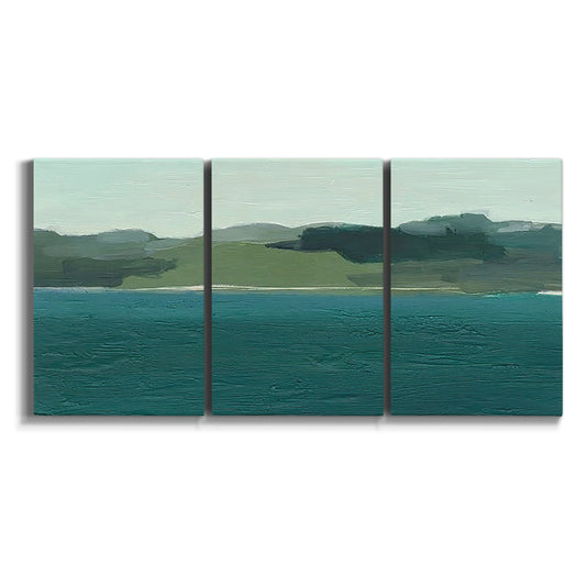 Three-panel canvas wall art featuring calm lake water under open sky on white background.