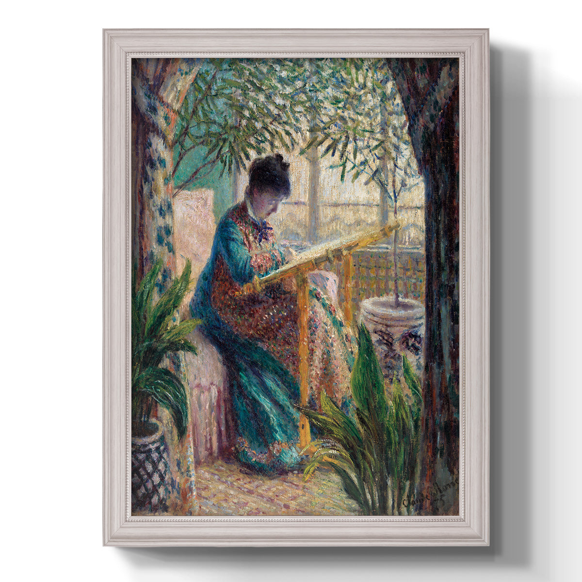 Impressionist portrait of Madame Monet sewing by Claude Monet printed on canvas in an ornate weathered white frame with a vertical orientation.