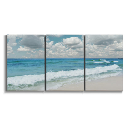 Three-panel canvas wall art featuring tropical beach scene with turquoise water on white background.