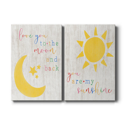 Set of two vertical canvas prints featuring inspirational moon and stars nursery artwork, displayed side by side.