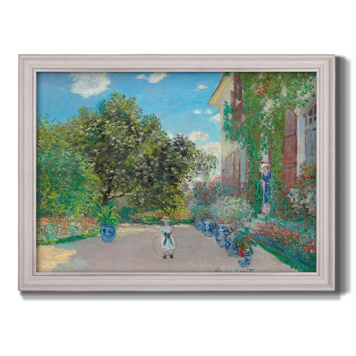 Impressionist residential landscape at Argenteuil by Claude Monet printed on canvas in an ornate weathered white frame.