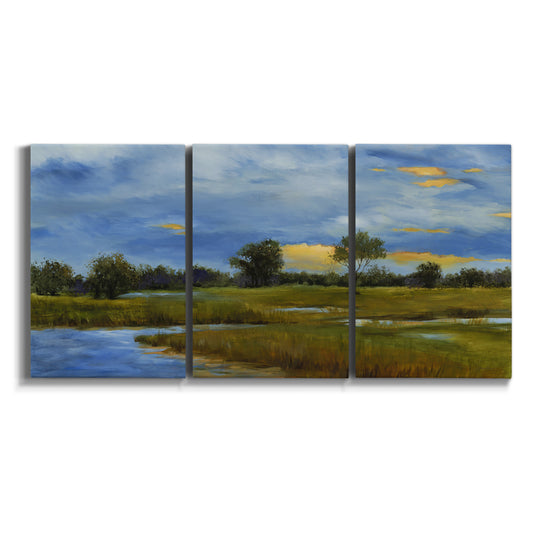 Three-panel canvas wall art featuring riverside walking path through greenery on white background.