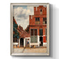Realist city street scene by Johannes Vermeer printed on canvas in an ornate champagne frame with a vertical orientation.
