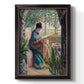 Impressionist portrait of Madame Monet sewing by Claude Monet printed on canvas in an ornate black frame with gilded inner detail with a vertical orientation.