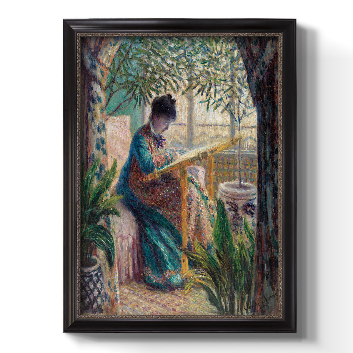 Impressionist portrait of Madame Monet sewing by Claude Monet printed on canvas in an ornate black frame with gilded inner detail with a vertical orientation.