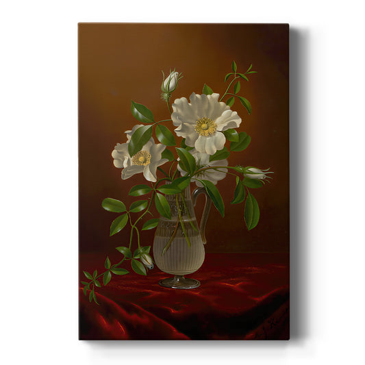 Canvas art print featuring a still life of white roses in a glass vase with soft natural light on a clean white background.