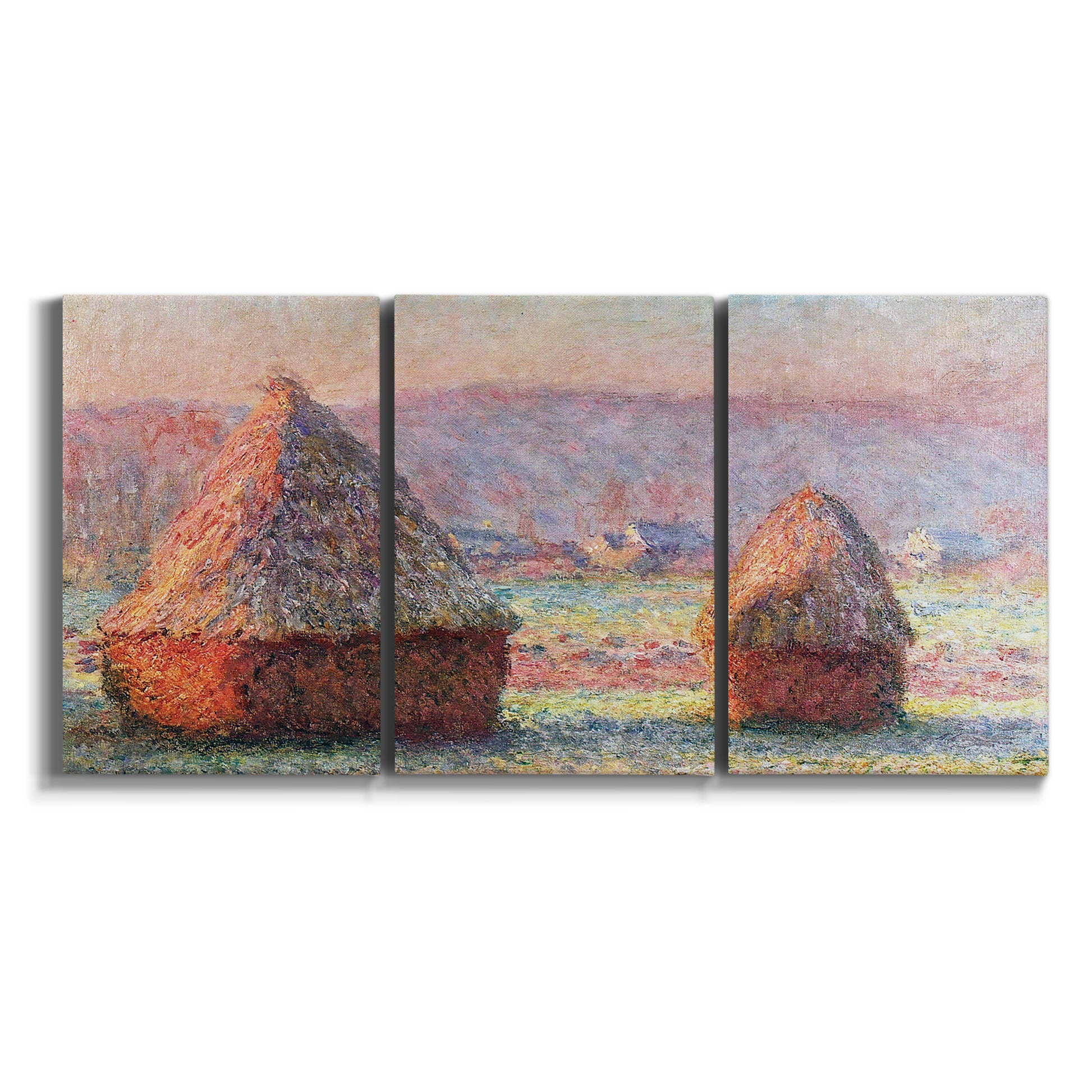 Three-panel canvas wall art featuring winter grainstacks glowing at sunset on white background.