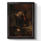 Classical religious portrait of Paul the Apostle by Rembrandt van Rijn printed on canvas in an ornate black frame with gilded inner detail with a vertical orientation.