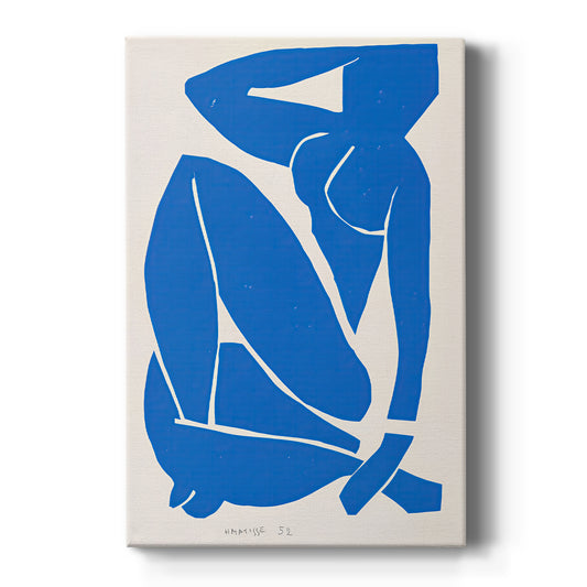 Canvas art print featuring an abstract cut-out figure of a seated nude in bold blue shapes on a clean white background.