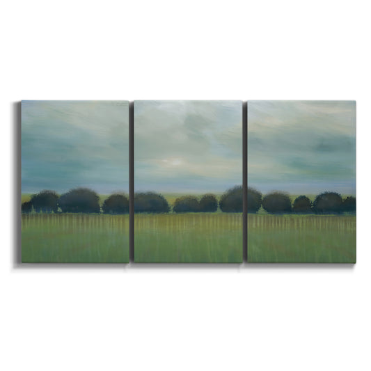 Three-panel canvas wall art featuring rolling green pastoral fields on white background.