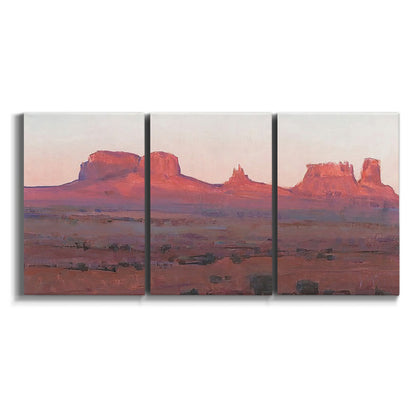 Three-panel canvas wall art featuring red rock desert formations at dusk on white background.