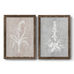 Set of two walnut barnwood framed canvas prints featuring two rustic minimalist botanical prints featuring white botanical silhouettes on softly weathered neutral backgrounds.