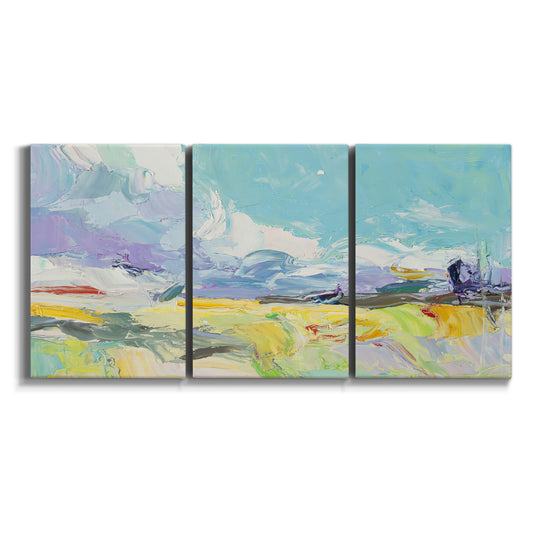 Three-panel canvas wall art featuring open landscape suggesting distant journey on white background.
