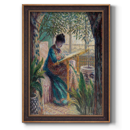 Impressionist portrait of Madame Monet sewing by Claude Monet printed on canvas in an ornate bronzed mahogany wood frame with a vertical orientation.