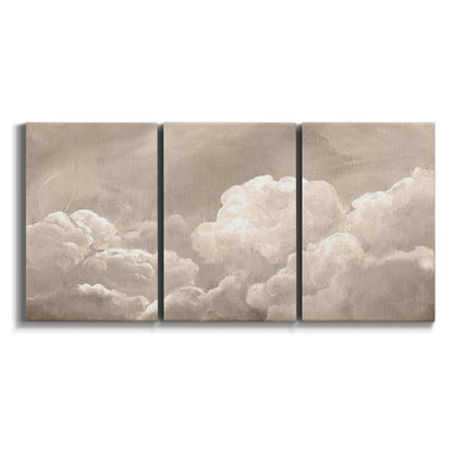 Three-panel canvas wall art featuring soft whimsical cloudscape on white background.