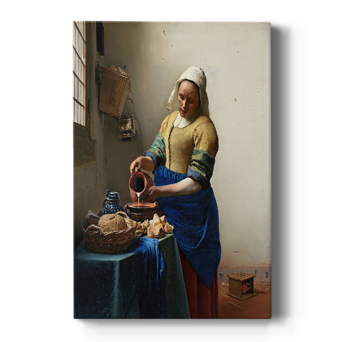Canvas art print featuring a Baroque interior of a woman pouring milk in soft window light on a clean white background.