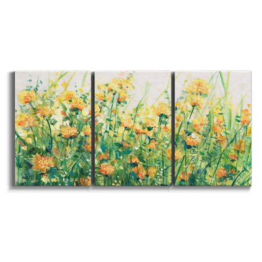 Three-panel canvas wall art featuring colorful garden flowers in bloom on white background.