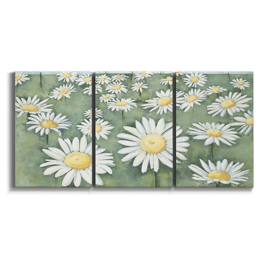 Three-panel canvas wall art featuring field filled with wildflowers on white background.