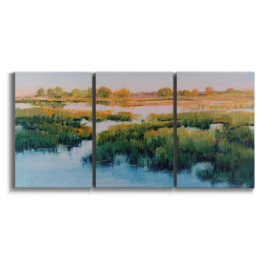 Three-panel canvas wall art featuring pastoral marshland landscape on white background.