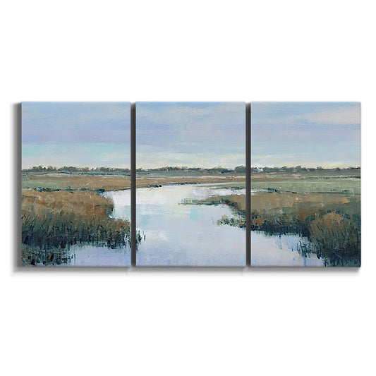 Three-panel canvas wall art featuring coastal plain with layered horizon on white background.