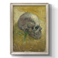 Profile skull study artwork by Vincent van Gogh printed on canvas in an ornate black frame with gilded inner detail with a vertical orientation.