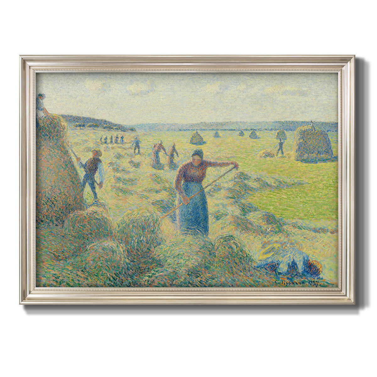Impressionist rural hay harvest landscape by Camille Pissarro printed on canvas in an ornate champagne frame.