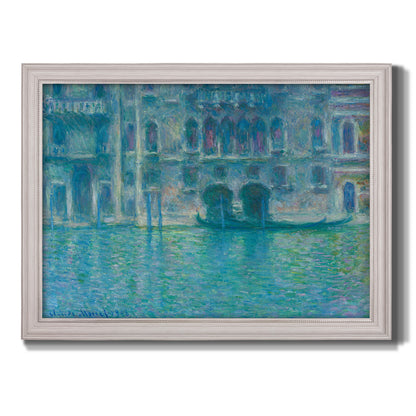 Impressionist Venetian palace waterfront scene by Claude Monet printed on canvas in an ornate weathered white frame.
