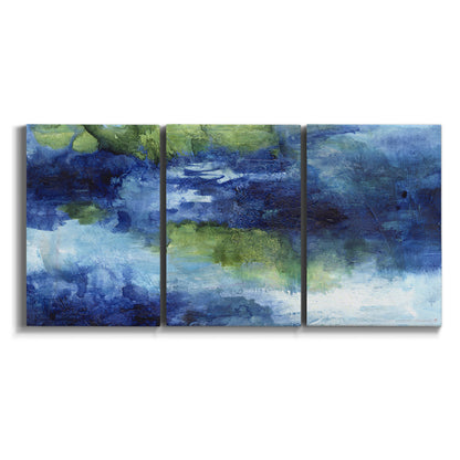 Three-panel canvas wall art featuring flowing blue abstract watercolor on white background.