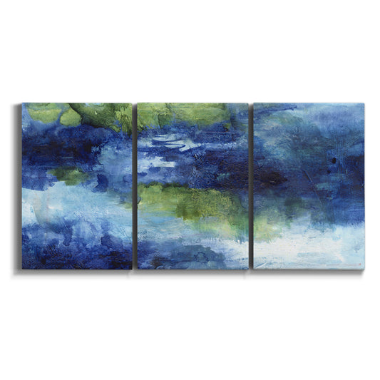 Three-panel canvas wall art featuring flowing blue abstract watercolor on white background.