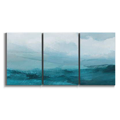 Three-panel canvas wall art featuring vertical coastal elements with rising light on white background.