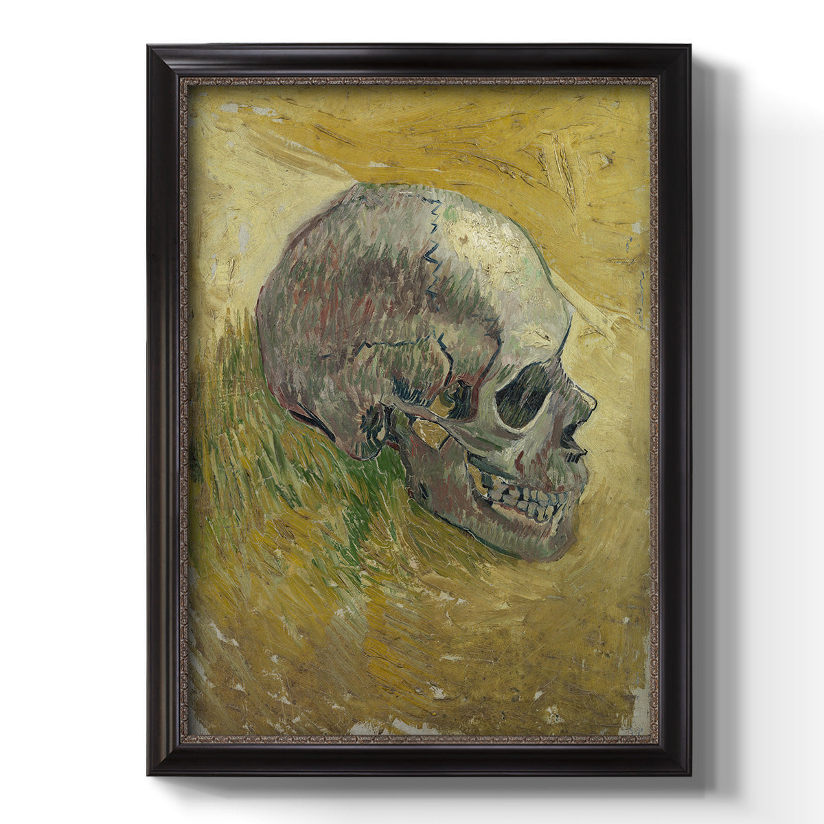 Profile skull study artwork by Vincent van Gogh printed on canvas in an ornate bronzed mahogany wood frame with a vertical orientation.