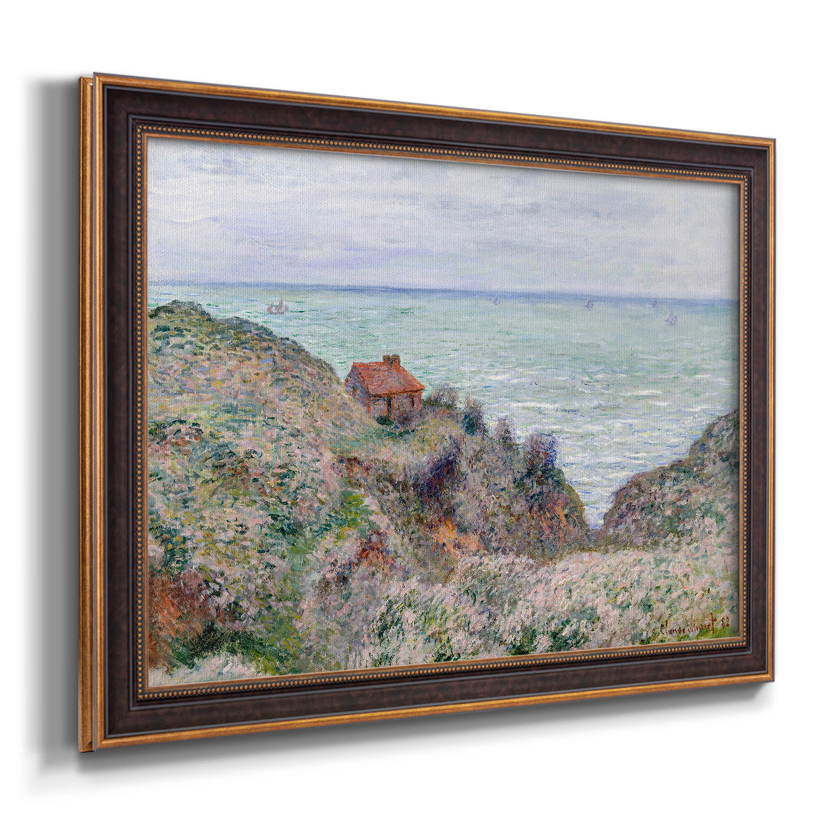 Impressionist coastal watch cabin scene by Claude Monet printed on canvas in an ornate bronzed mahogany wood frame.