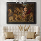 Dramatic biblical painting of Daniel with lions by Peter Paul Rubens in an ornate black frame with gilded inner detail displayed in a neutral-toned interior setting.