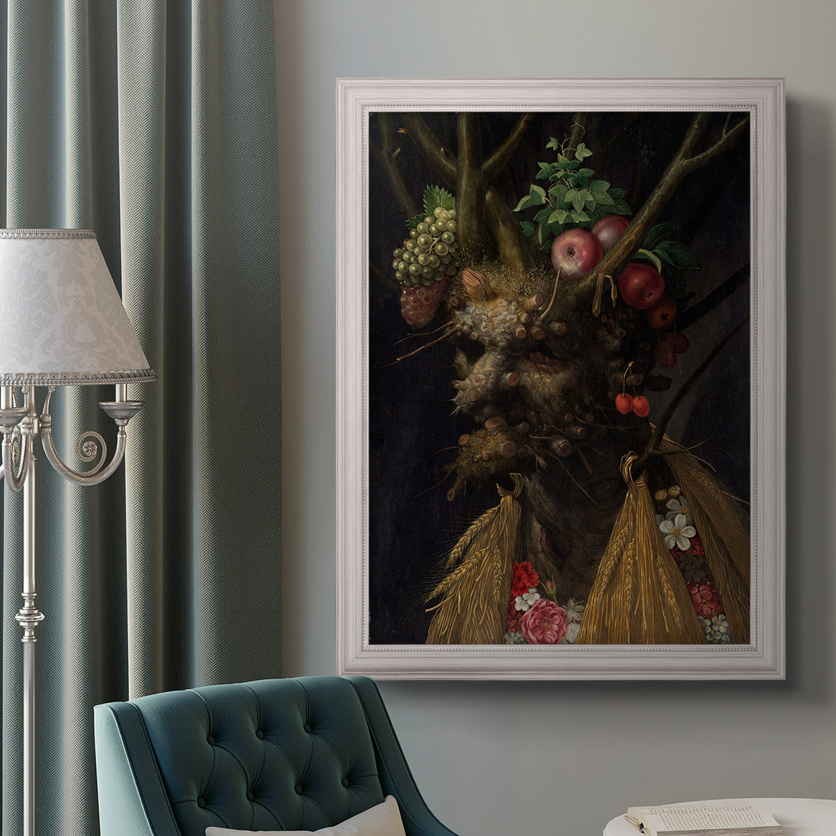 Surreal allegorical portrait representing the four seasons by Giuseppe Arcimboldo in an ornate weathered white frame displayed in a neutral interior setting.