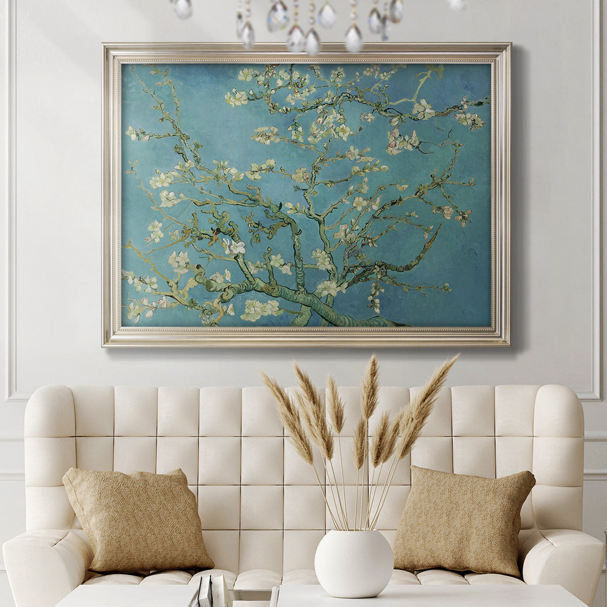 Impressionist flowering almond branch painting by Vincent van Gogh in an ornate champagne frame displayed in a neutral-toned interior setting.