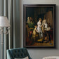 Classical interior painting of an artist at work by Louis-Leopold Boilly in an ornate black frame with gilded inner detail displayed in a neutral interior setting.