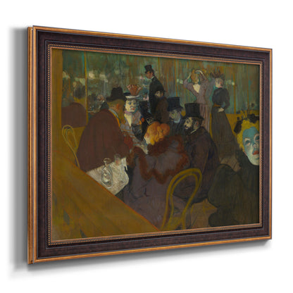 Impressionist cabaret interior scene by Henri de Toulouse-Lautrec printed on canvas in an ornate bronzed mahogany wood frame.
