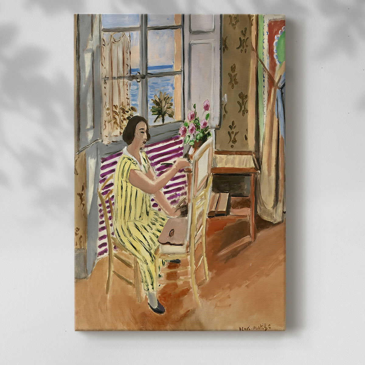 Canvas art print of a stylized domestic setting with bold textiles and color blocks with a soft shadow on a white background.