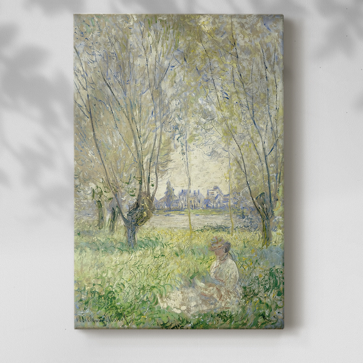 Canvas art print of a figure resting in nature with light filtering through foliage with a soft shadow on a white background.