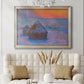 Impressionist haystack scene at sunset by Claude Monet in an ornate champagne frame displayed in a neutral-toned interior setting.