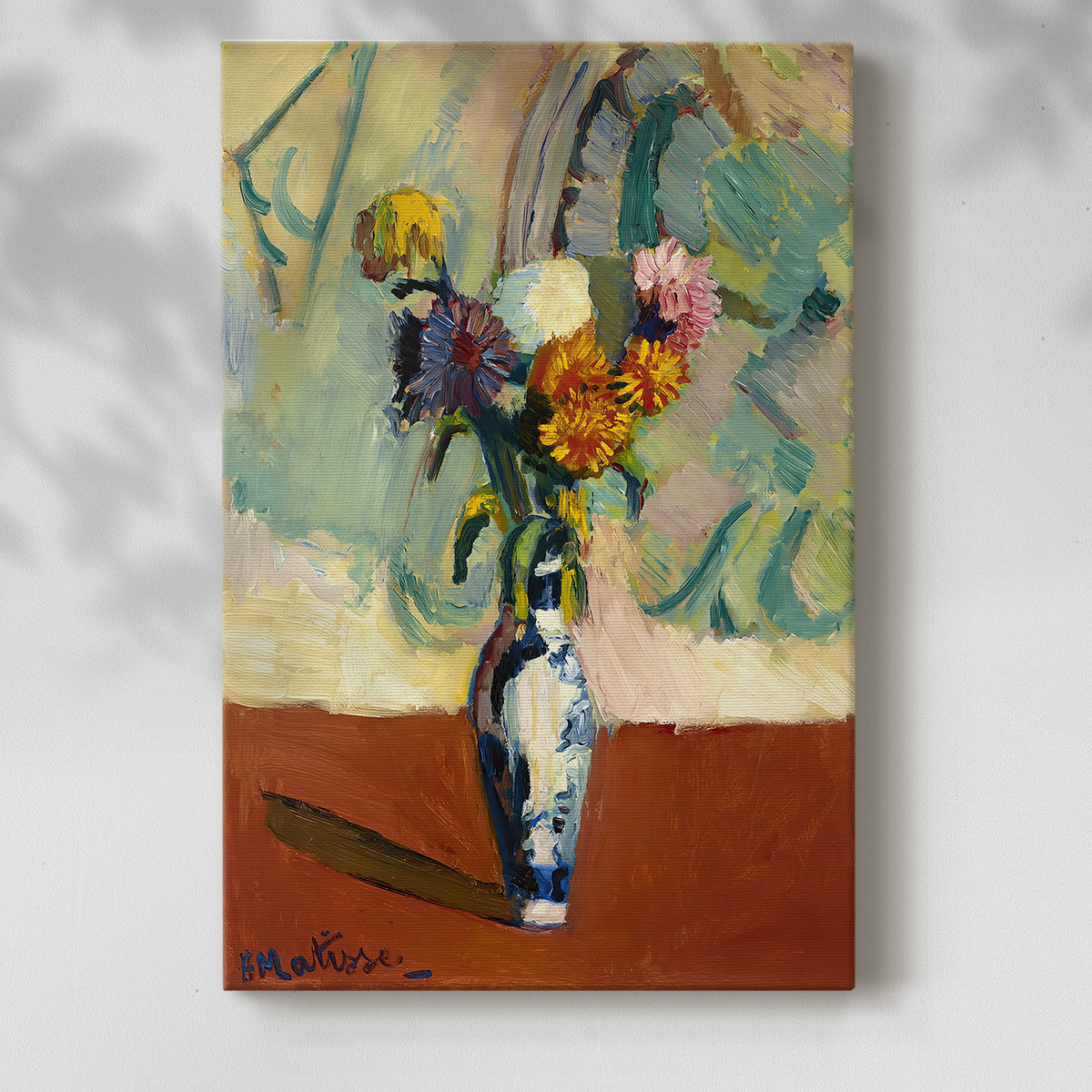 Canvas art print of a floral arrangement with bold tones and patterned container with a soft shadow on a white background.