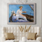 Impressionist leisure boating scene by Édouard Manet in an ornate weathered white frame displayed in a neutral-toned interior setting.