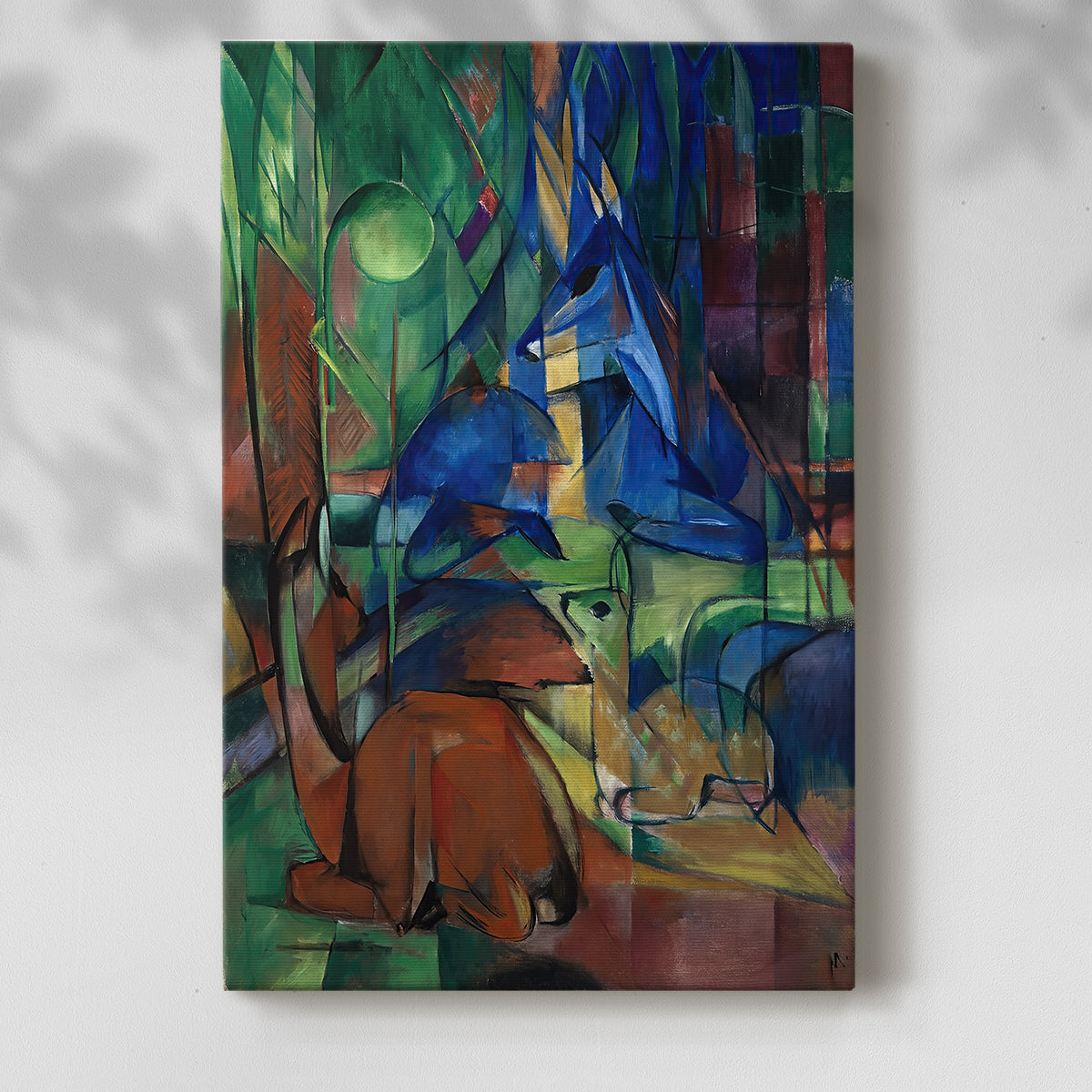 Canvas art print of a geometric forest composition with animals and vivid tones with a soft shadow on a white background.